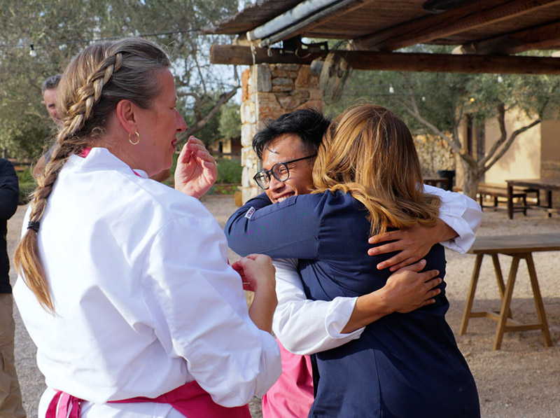 Chef Argiro hugging contestant Sam.