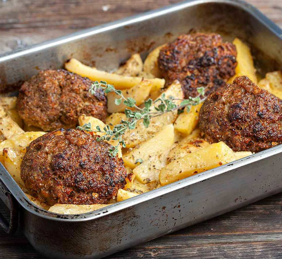 Beef Patties with Potatoes in the Oven